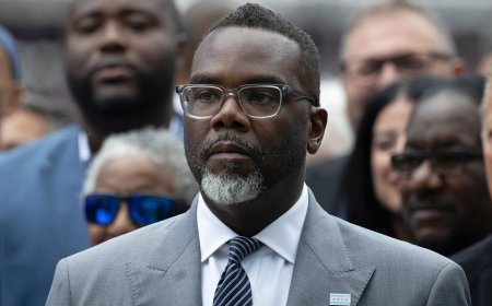 Why would a city mayor defend a dictator while his own streets continue to burn?