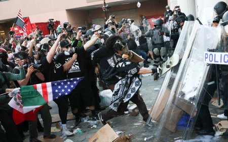 LAPD arrests violent agitators after protests erupt outside federal detention center in Los Angeles