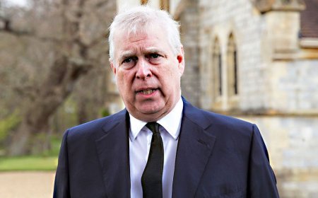 Ex-Prince Andrew photographed kneeling over woman in latest DOJ Jeffrey Epstein file release