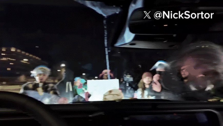 Anti-ICE agitators swarm vehicle of conservative influencer Nick Sortor