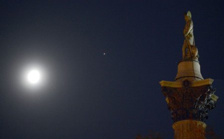 See the moon glow next to mighty Jupiter in the winter sky tonight