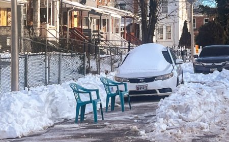 Snowstorm parking wars turn violent as cities crack down, neighbors clash and police warn of escalation