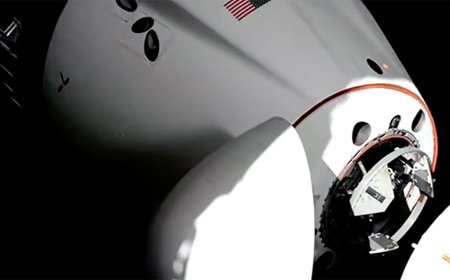 SpaceX Dragon astronauts make Valentine's Day docking at space station to boost skeleton crew (video)