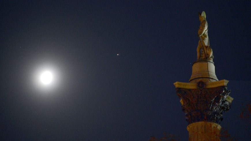 See the moon glow next to mighty Jupiter in the winter sky tonight