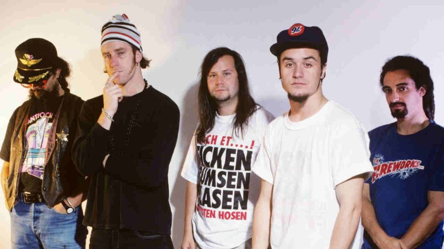 "I was being bombarded with Madonna's image on TV." How a beloved rock band took aim at a pop megastar, sampled Simon & Garfunkel and ushered in a genre-mashing masterpiece with a 90s classic