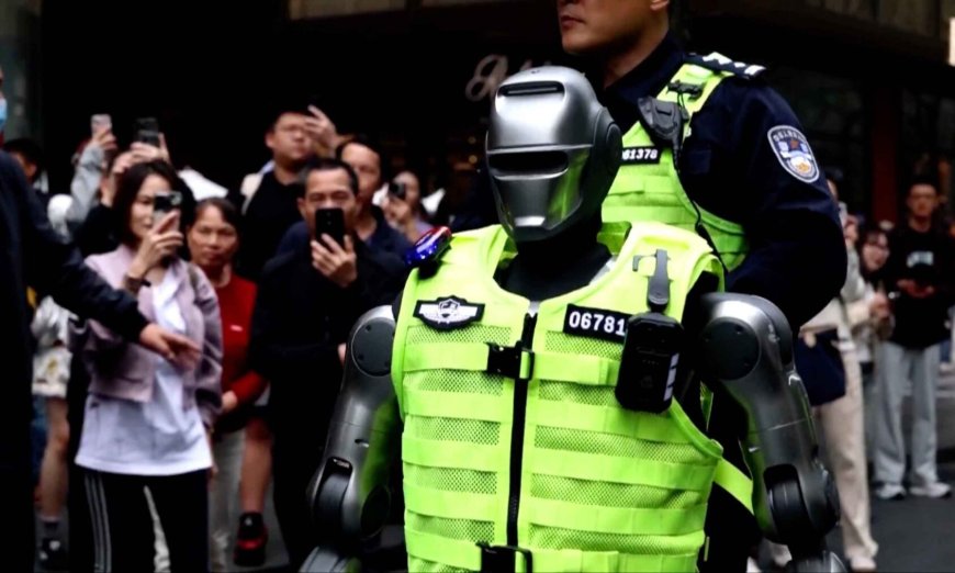 China is deploying robotic police officers equipped with cameras that operate 24 hours a day on the streets to replace human workers and normalize total automation