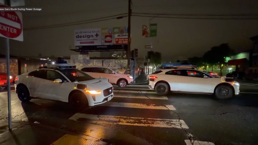 A driverless taxi froze in the middle of a San Francisco street, and a dozen more rolled up behind it like a “polite” traffic jam