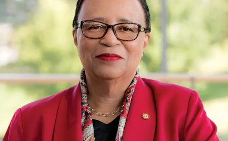 Black Brilliance Behind the Phone in Your Hand