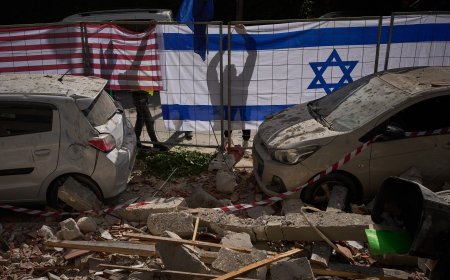 Israeli minister says electricity grid in north was damaged as media show fire near Haifa refinery