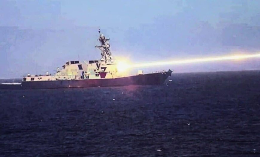 A U.S. Navy Destroyer Vaporizes a Drone Swarm at Sea with a Powerful Laser Beam
