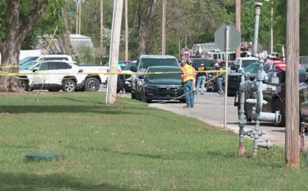 High school principal shot after confronting man with gun at his school