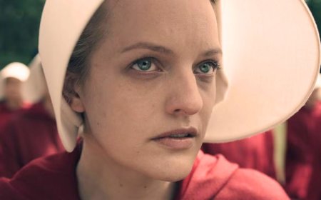 'If I can convince her to act, I will shamelessly do it': The Testaments creator on Elisabeth Moss' surprise return as June to The Handmaid's Tale spinoff