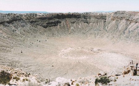 Scientists exploring a vast coastline discovered a massive field of glass stretching for miles and now suspect an unknown meteorite caused it