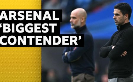 Guardiola proud to be challenging Arsenal for title