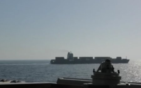 US Navy fires on Iranian-flagged cargo ship attempting to breach blockade in Gulf of Oman, officials say