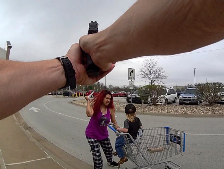 Omaha police fatally shoot a woman who grabs a child and slashes him with a knife outside Walmart