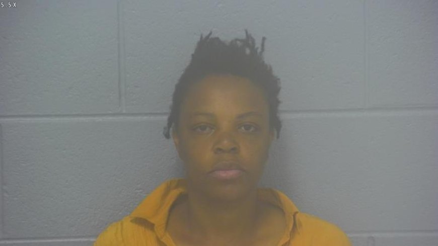 Woman accused of throwing chairs, smashing pool cues during disturbance at Springfield bar