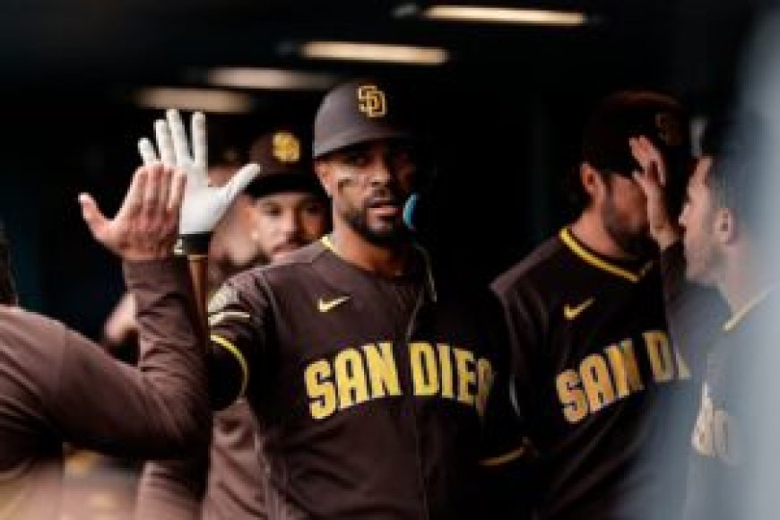 Padres score 5 in ninth to rally past Rockies