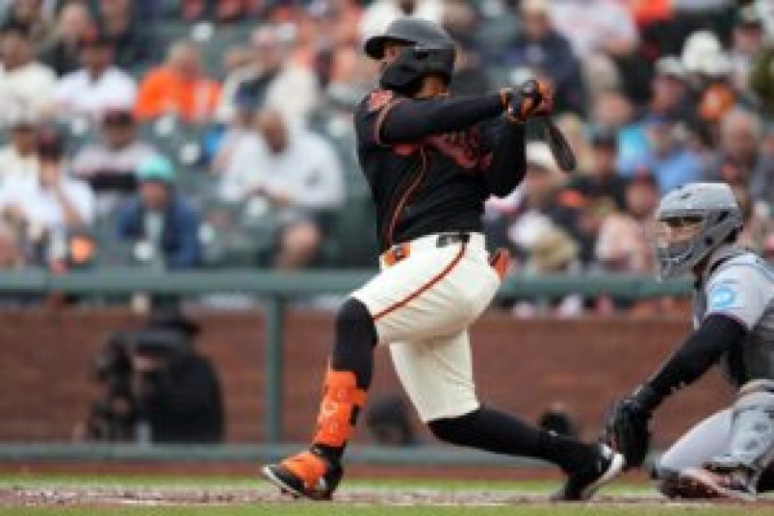 Giants go deep three times to down Marlins