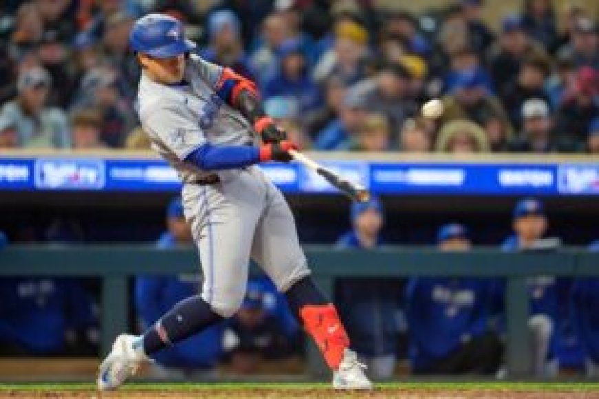 Blue Jays post 8-run inning, rally over Twins