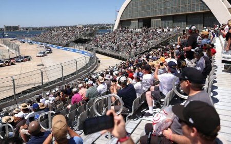 Fan hops fence during red-flagged NASCAR race at San Diego's Naval Base Coronado to meet a driver