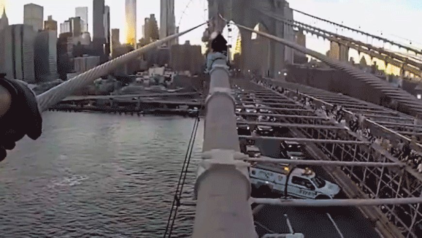Dramatic bodycam captures NYPD officer rescuing woman from top of Brooklyn Bridge after emotional plea