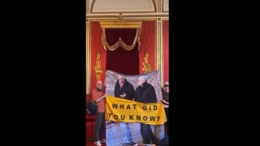 “What Did I Know?” – Protesters Unfurl Massive Photo Of Prince Andrew With Jeffrey Epstein Inside Buckingham Palace Throne Room 