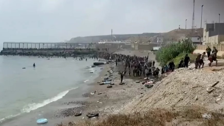‘It’s An Invasion’: Footage Shows Thousands of Male African Migrants Storm Spanish City of Ceuta