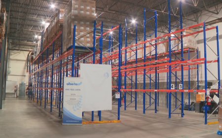 Bare shelves at Alberta food banks as demand soar: ‘Very difficult year’