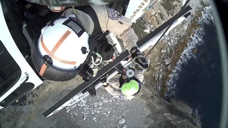 Helicopter rescue crew caught on camera saving 2 climbers trapped along popular California beach cliff