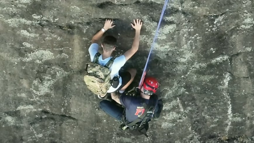 Free climber stranded on Georgia rock face calls 911, prompting dramatic rescue by firefighter