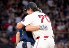 Red Sox starter records an out in hilarious fashion by hugging Mariners' baserunner