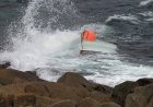 Teen boater found clinging to capsized vessel after 3 go missing; 2 bodies recovered