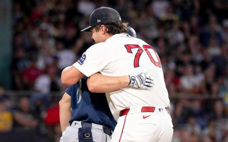 Red Sox starter records an out in hilarious fashion by hugging Mariners' baserunner
