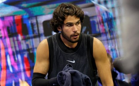Tennis star Carlos Alcaraz vomits in towel during US Open thriller after trying to shoo cameras away