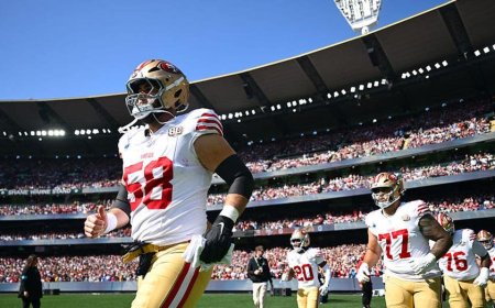 Sold out Melbourne crowd stands for 25th anniversary commemoration of 9/11 at NFL's first Australia game