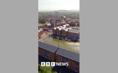 Why are plans for Gloucestershire's 'super council' on hold?