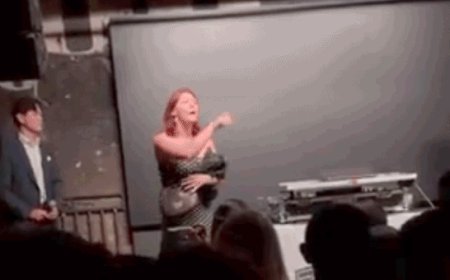 Protester storms DC party, flips off crowd as ‘USA!’ chants erupt amid Trump’s AI push