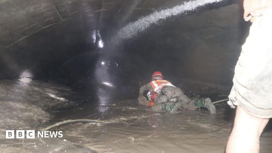 Nepal rescuers try to reach dozens trapped in tunnel after two found alive