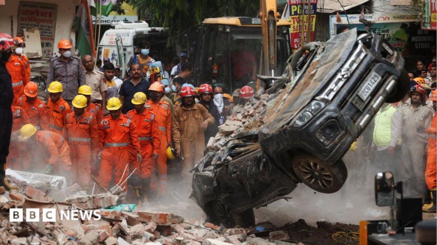 Six dead and more feared trapped in collapsed building in Delhi