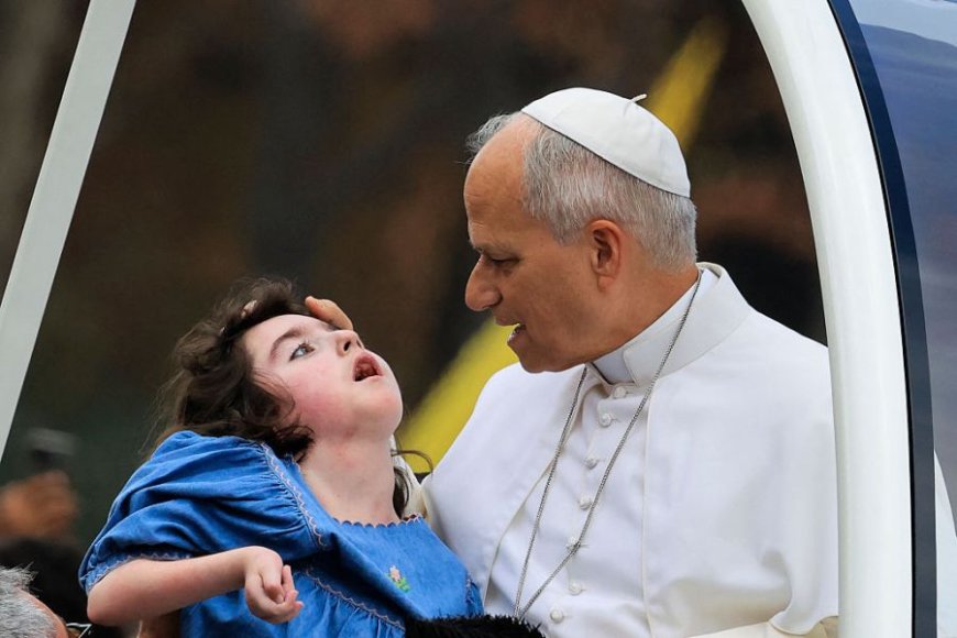Pope Leo’s tender blessing of girl with disabilities captures spirit of his France trip