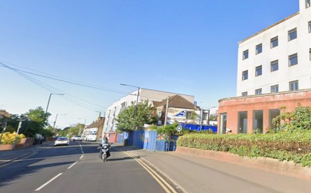Two men arrested after man in his 40s found dead