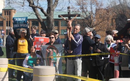 Iowa city council meeting erupts after former member opens meeting with satanic prayer and 'Hail Satan'