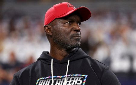 Buccaneers coach Todd Bowles suffers health scare after taking helmet to the stomach during celebration